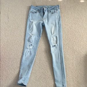 Distressed light wash jeans